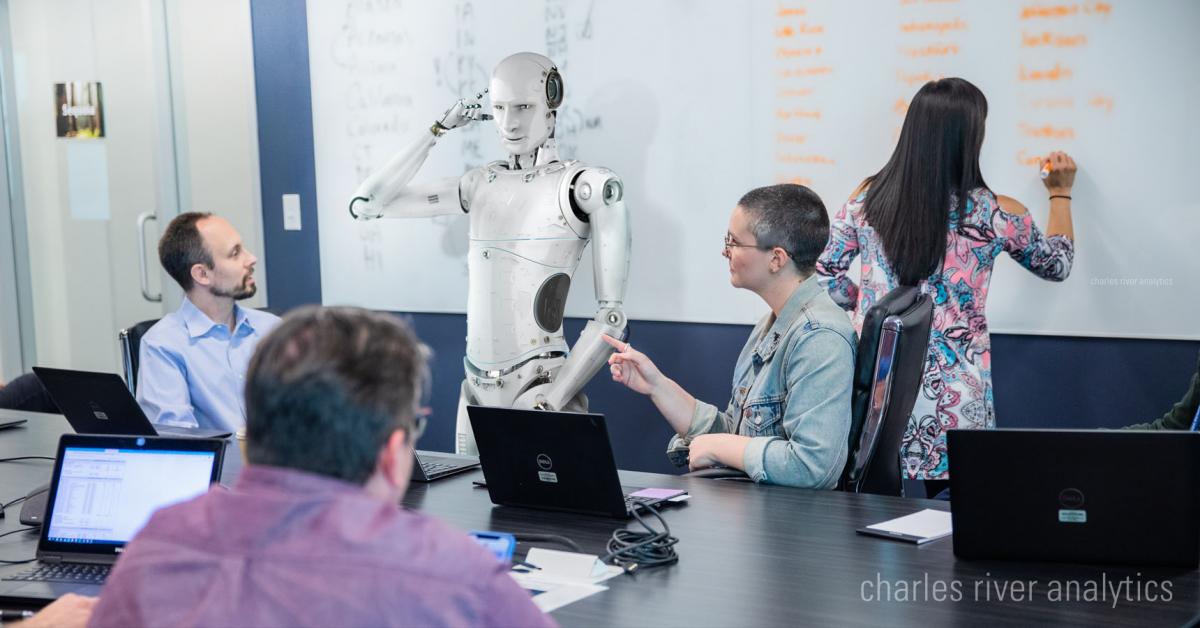 Image of Charles River team working on AI project.